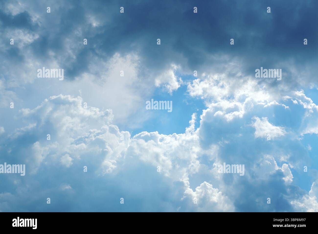 Dramatic sky with grey and white clouds with copy space Stock Photo