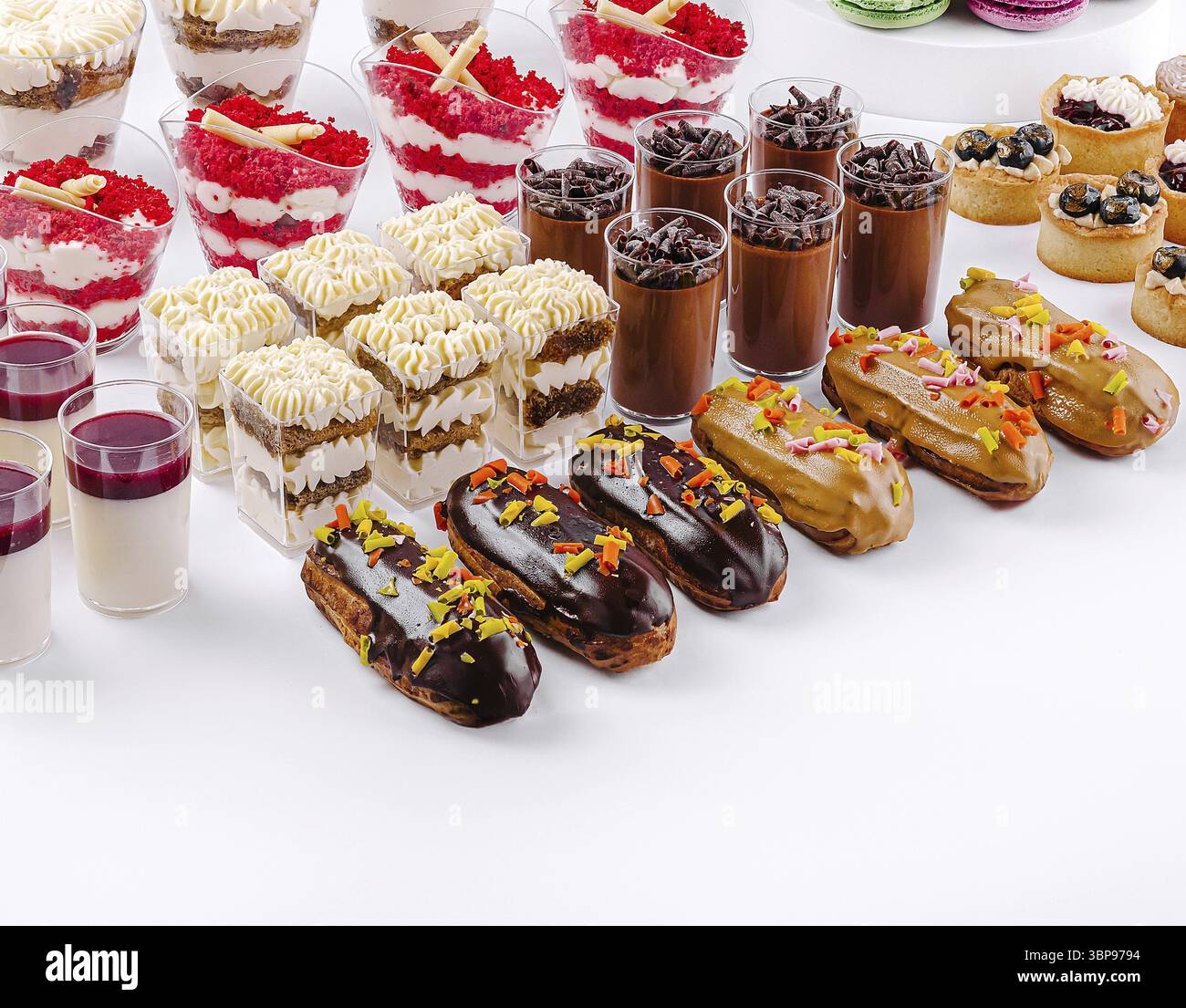 Food, A colorful array of desserts is beautifully arranged on a table ...