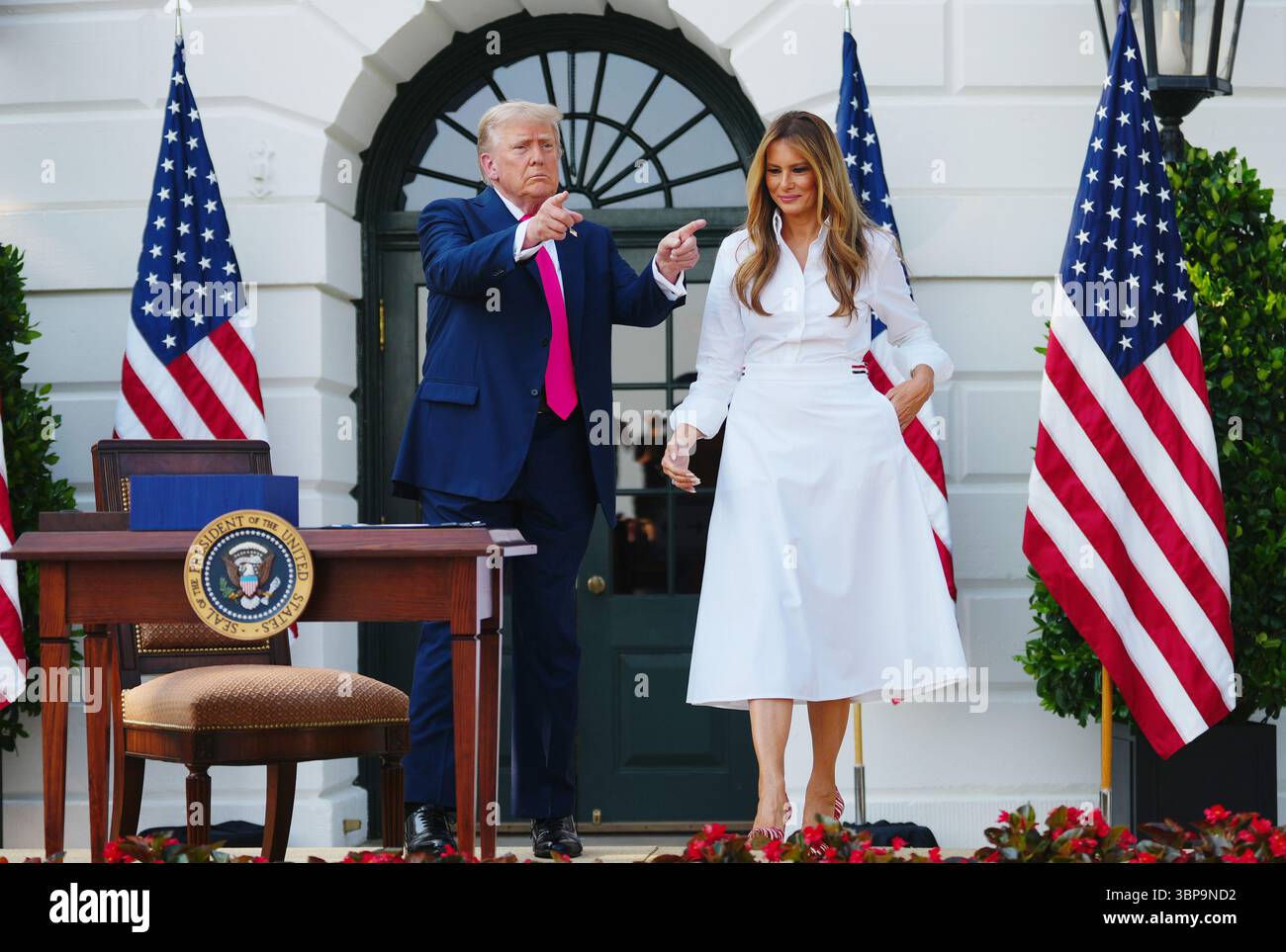 President Donald Trump and First Lady Melania Trump arrive for a bill