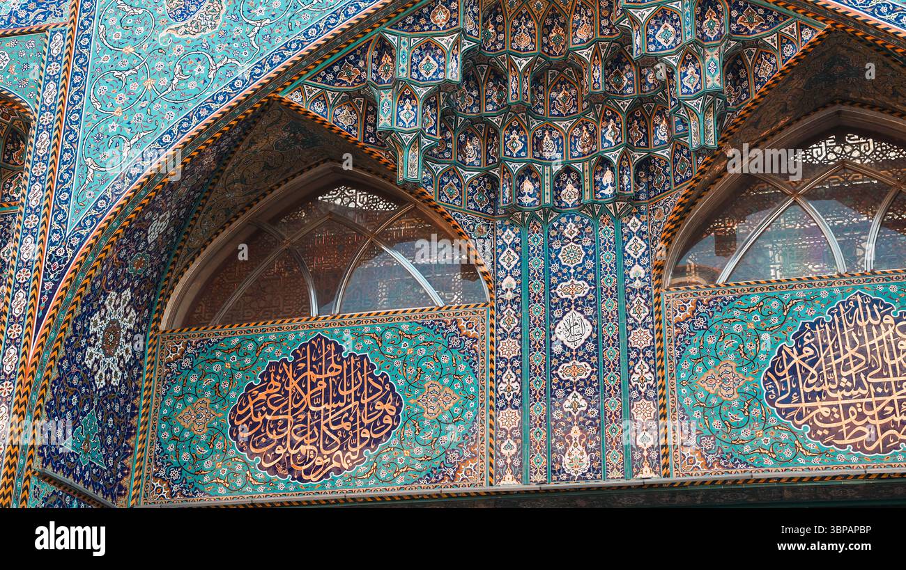 Visitors admire the intricate tile work and vibrant colors of a ...