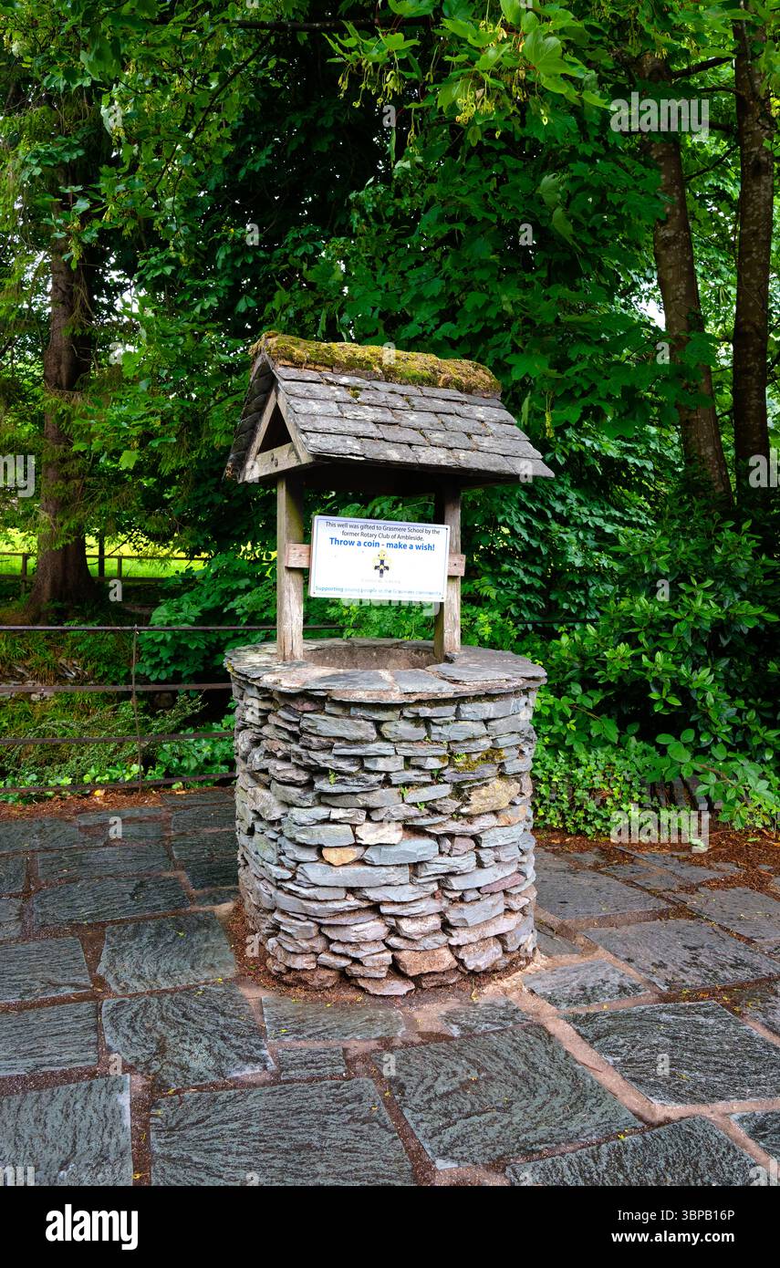 Wishing well in Grasmere, Lake District, Cumbria, England Stock Photo