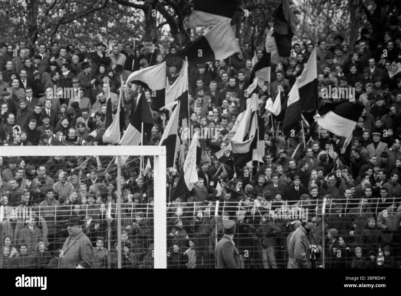 Sixties, sports, football, Bundesliga, 1966/1967, MSV Duisburg vs. BVB Borussia Dortmund 1-5, 05.11.1966, Wedau Stadium in Duisburg, by a goal the BVB fans in the stands will be put into a good mood Stock Photo
