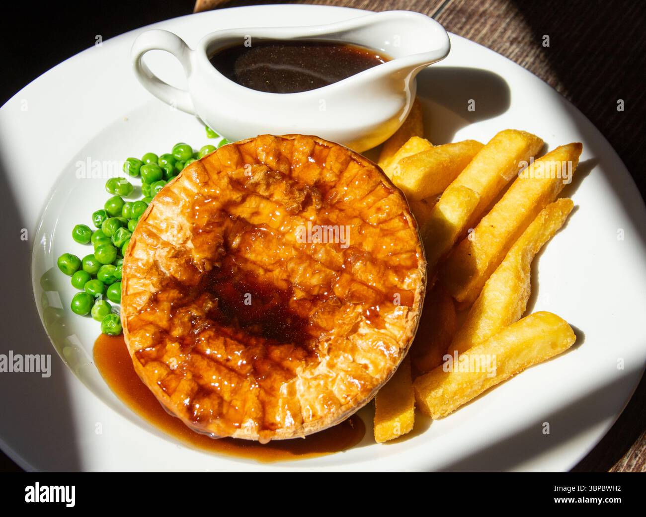 Chicken and mushroom pie at Hole in the Wall restaurant, York, UK Stock Photo