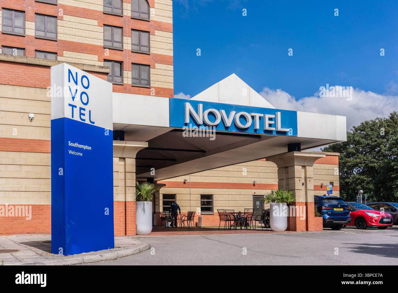 Novotel owned by Accor sign at an entrance of a hotel in Southampton ...
