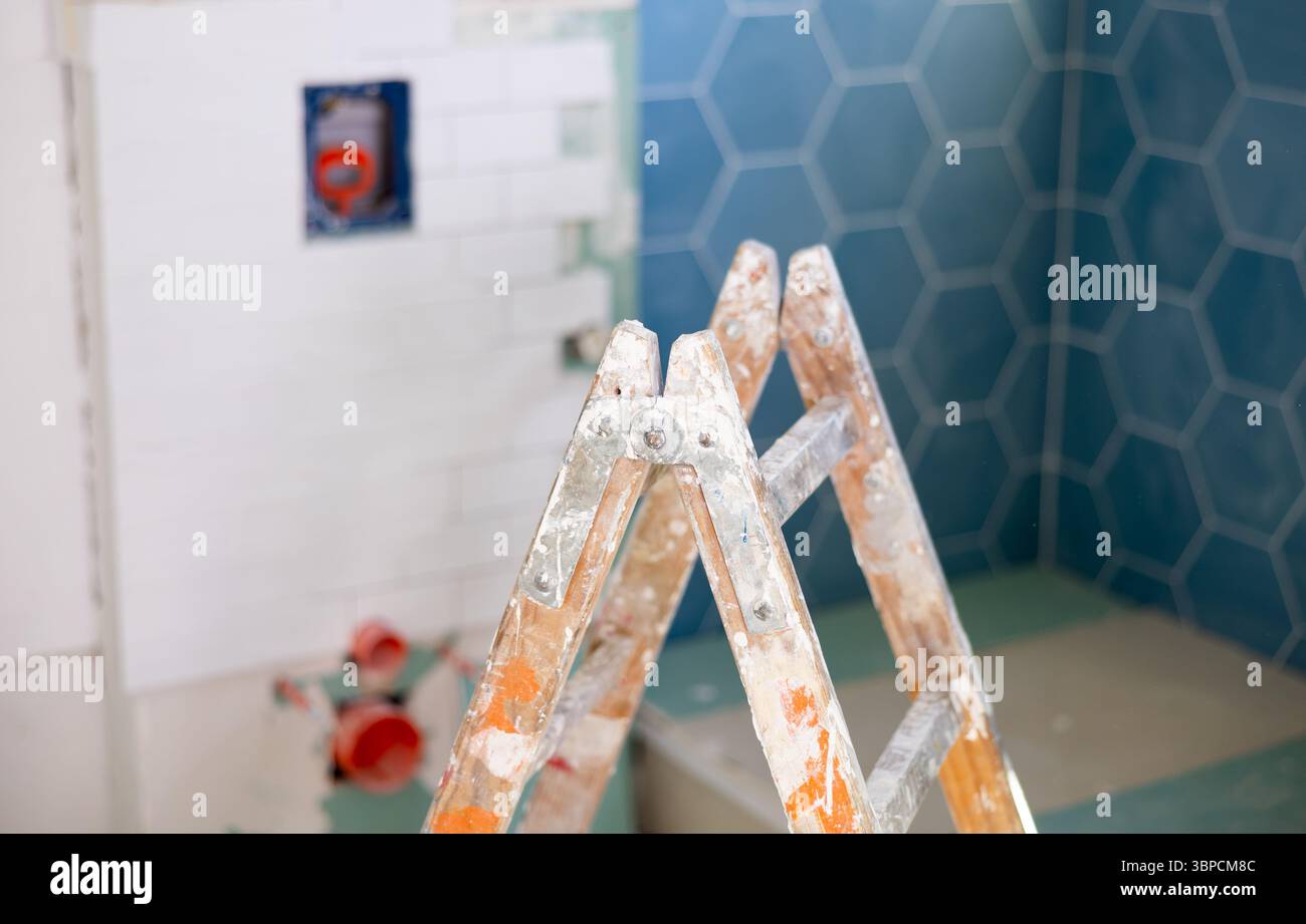 Stepladder in bathroom during renovation works Stock Photo