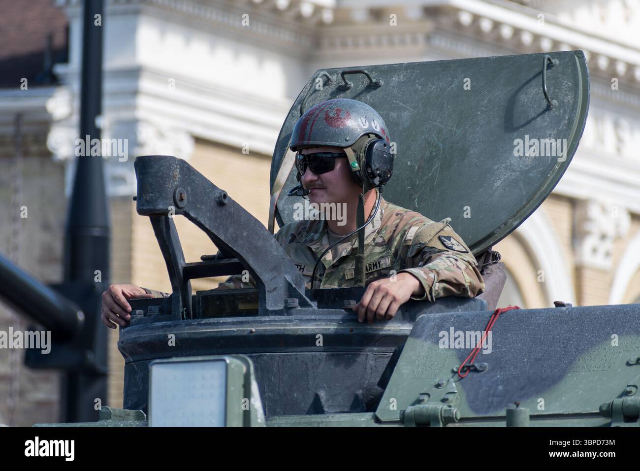 Provo, UT – July 4, 2025: US Army personnel ride atop a military ...