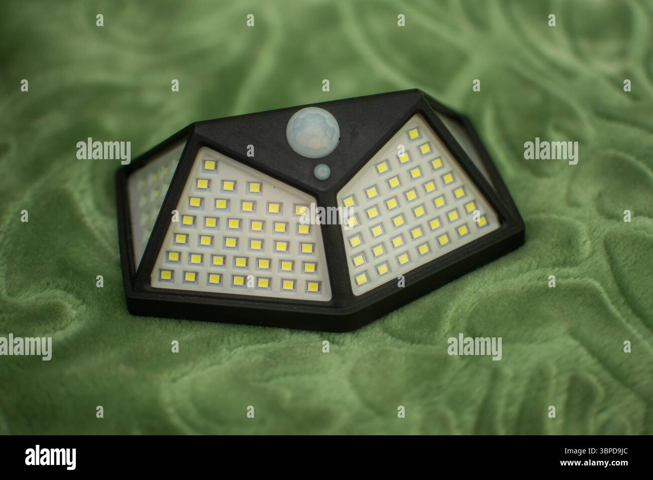 new Solar lamp with motion sensor 100 LED, waterproof, for outdoor, wall mounting Stock Photo