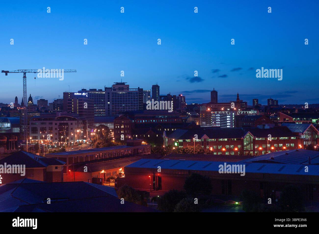 A night time view of Leeds city centre skyline, from the south, in 2002, without modern high rise buildings, West Yorkshire, Northern England, UK Stock Photo