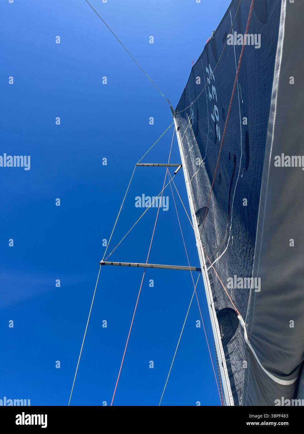 Sailing across open waters, chasing the horizon and the calm of the sea. Lost in the rhythm of the waves, where the wind and sea become one. - Smartphone Captured Stock Image