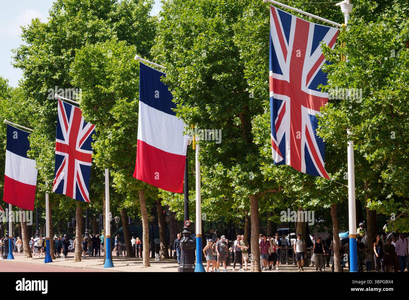 As French President Emmanuel Macron starts his state visit to the UK, the British Union Jack and the French Tricolore flags hang over Whitehall, on 8th July 2025, in London, England. Stock Photo