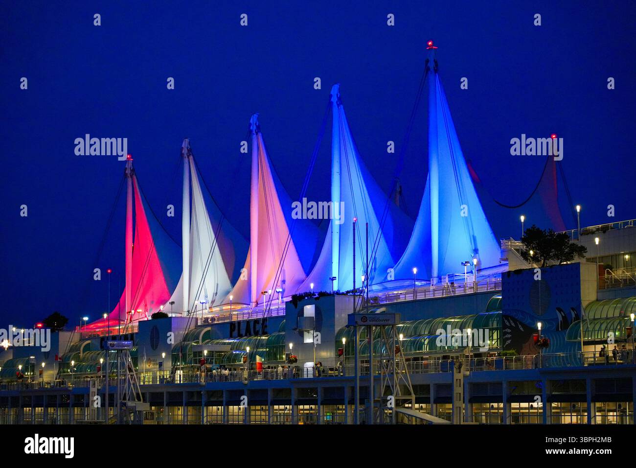 Sails on top of the Canada Place building, a Convention Centre and Cruise Ship Terminal on the Burrard Inlet in Downtown Vancouver, British Columbia, Stock Photo