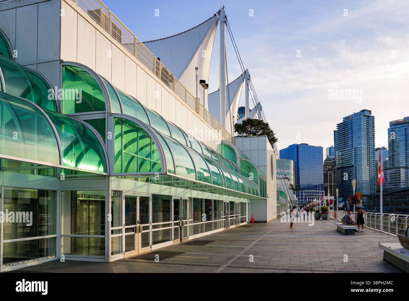 Waterfront promenade of Canada Place, a Convention Centre and Cruise Ship Terminal on the Burrard Inlet in Downtown Vancouver, British Columbia, Canad Stock Photo
