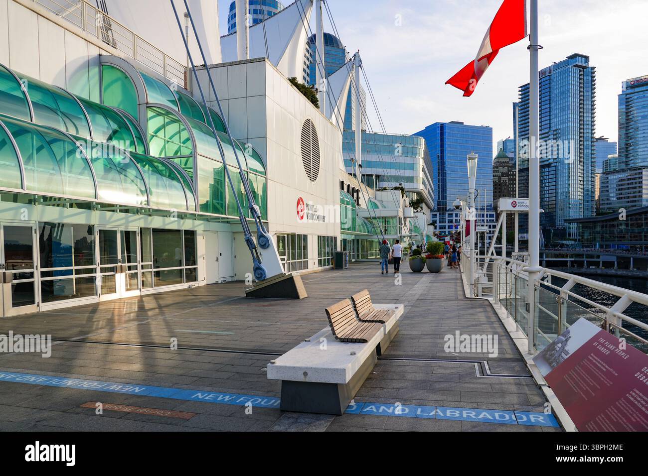 Waterfront promenade of Canada Place, a Convention Centre and Cruise Ship Terminal on the Burrard Inlet in Downtown Vancouver, British Columbia, Canad Stock Photo