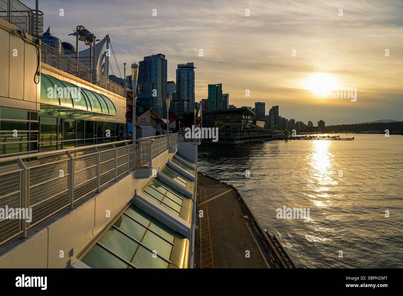 Sunset in Canada Place, a Convention Centre and Cruise Ship Terminal on the Burrard Inlet in Downtown Vancouver, British Columbia, Canada Stock Photo