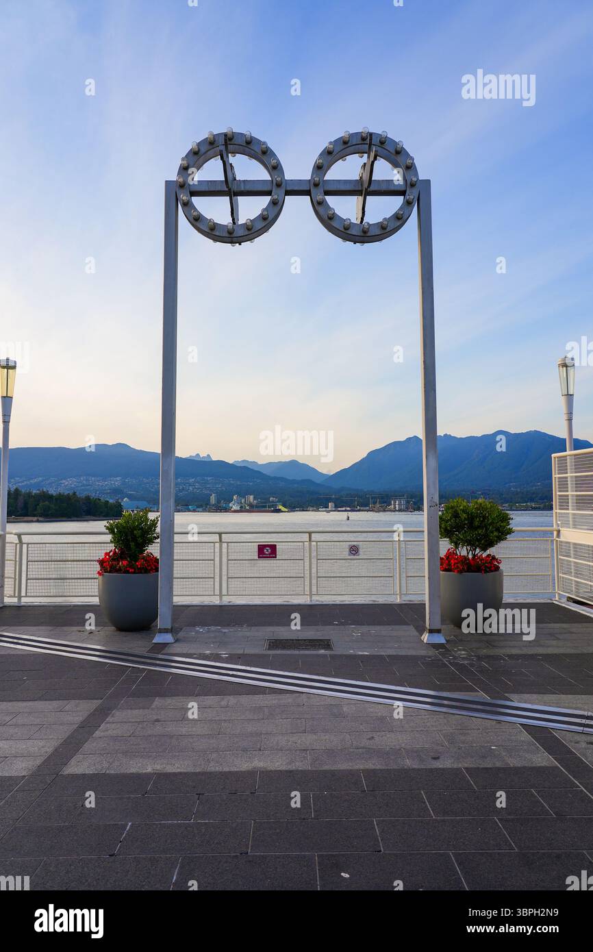 Waterfront promenade of Canada Place, a Convention Centre and Cruise Ship Terminal on the Burrard Inlet in Downtown Vancouver, British Columbia, Canad Stock Photo