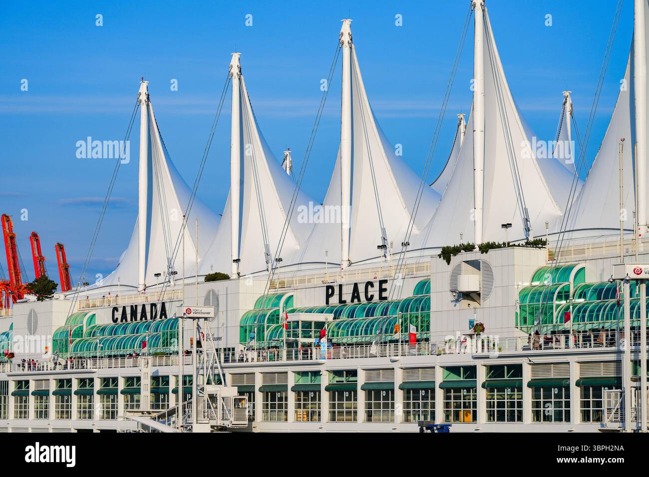 Sails on top of the Canada Place building, a Convention Centre and Cruise Ship Terminal on the Burrard Inlet in Downtown Vancouver, British Columbia, Stock Photo