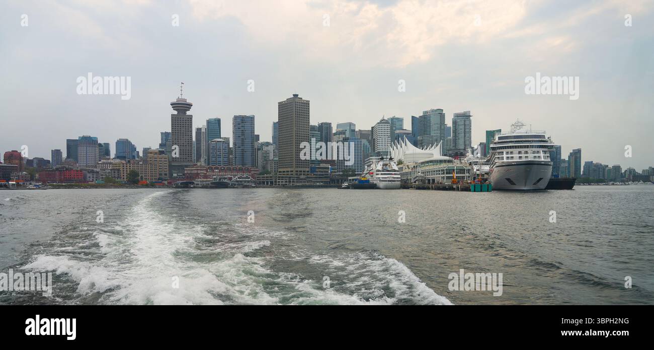 Vancouver skyline with Canada Place, a Convention Centre and Cruise Ship Terminal on the Burrard Inlet in British Columbia, Canada Stock Photo