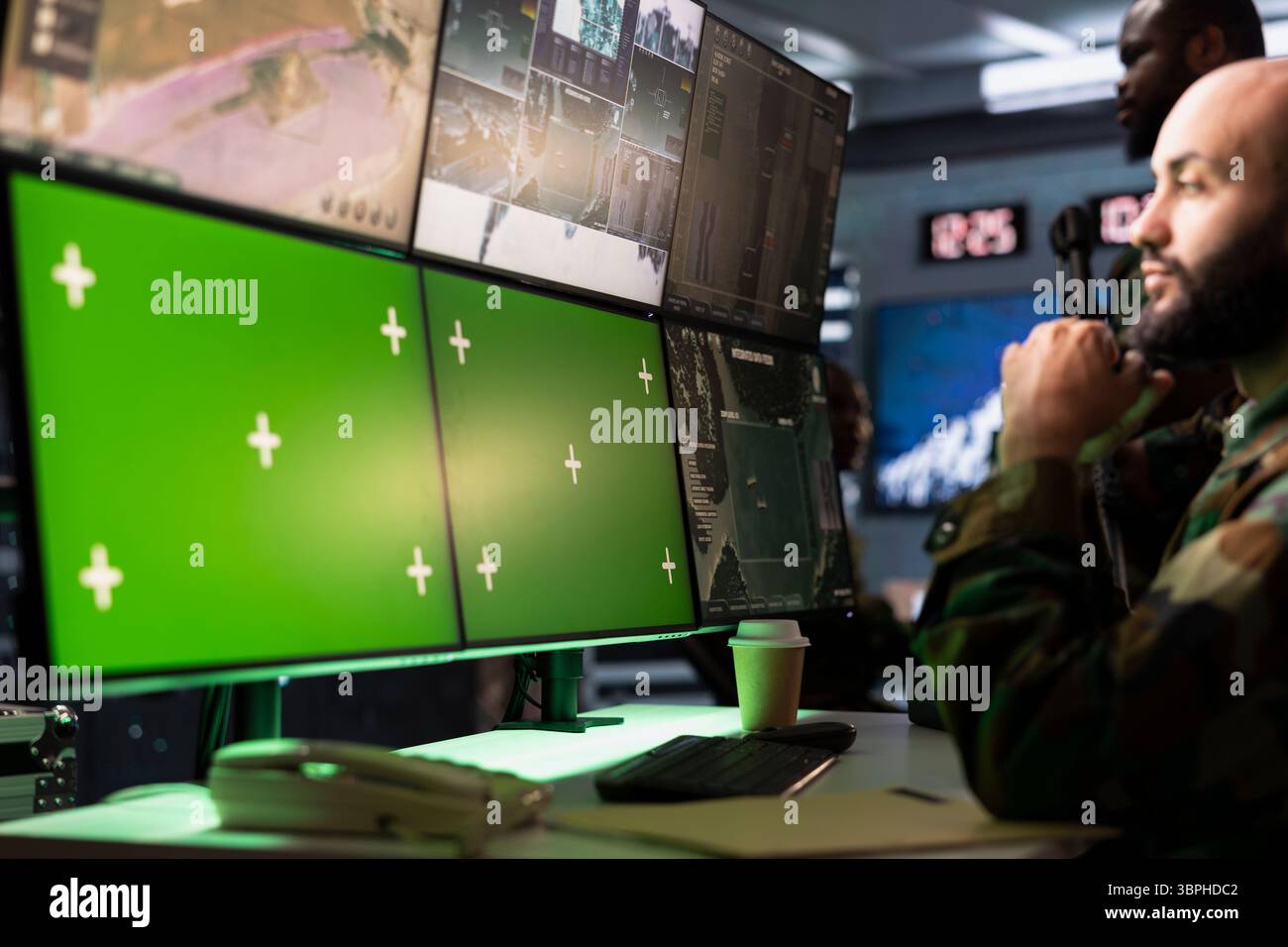 Air defense operative using radar on green screen equipment to detect ...