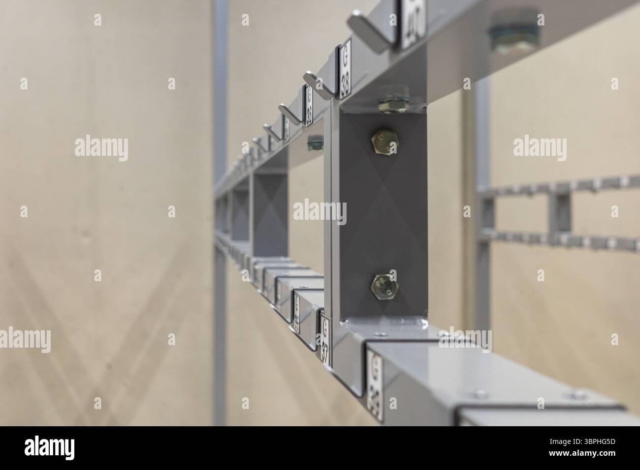 Racks with hooks for coats and jackets inside the public cloakroom ...