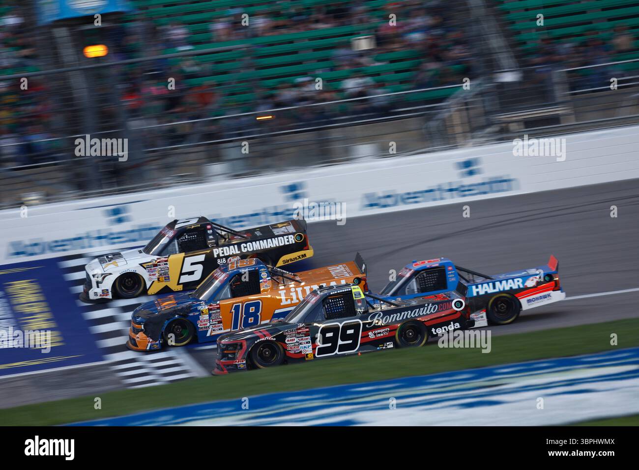 BEN RHODES (99) leads the field for the Heart of Health Care 200 in Kansas City, KS. Stock Photo