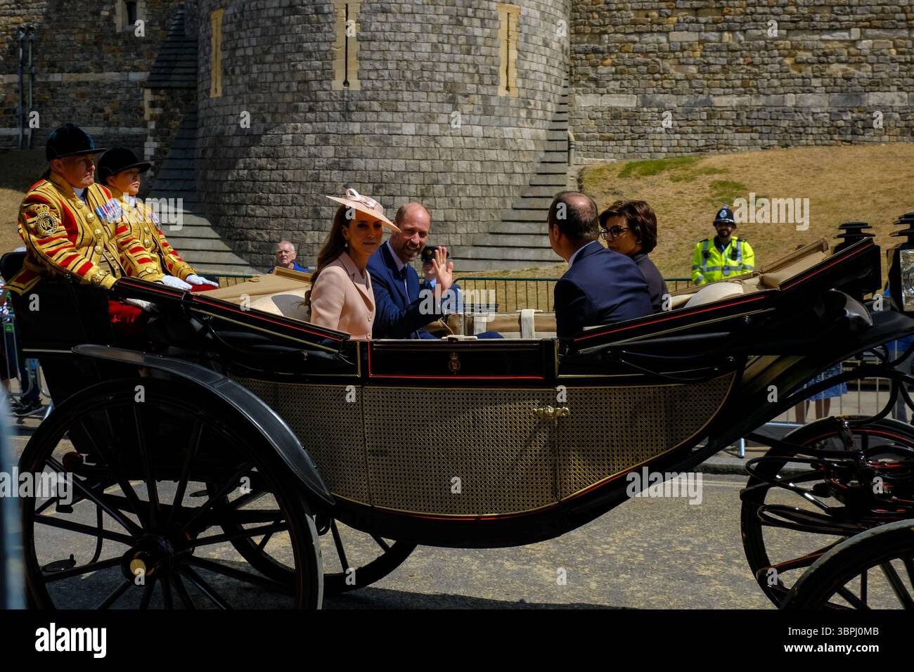 Catherine and William, the Princess and Prince of Wales ride past royal ...
