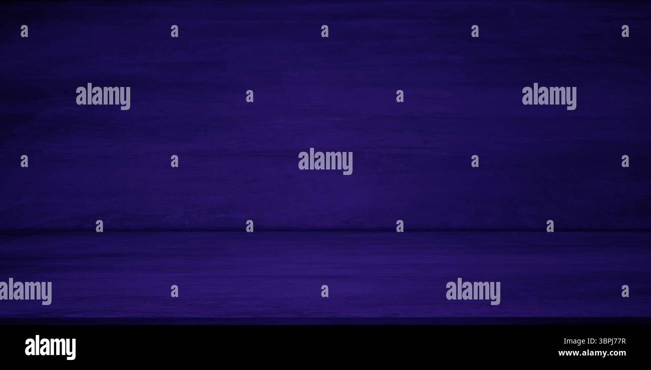 Dark purple wall concrete studio interior, cement floor backdrop with copy space. Stock Photo