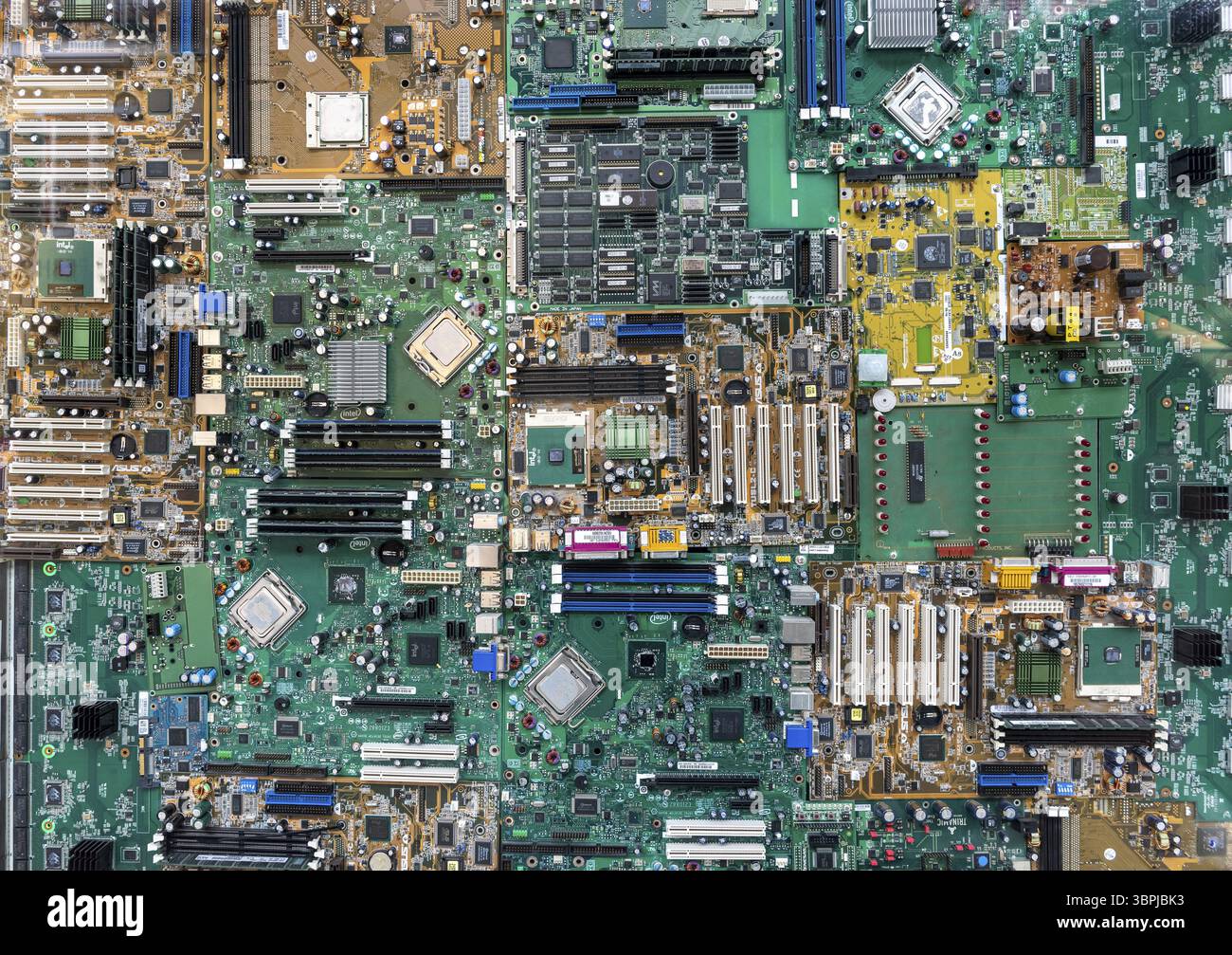 Row Computer Part View of several computer boards lined up in a row Stock Photo - Alamy