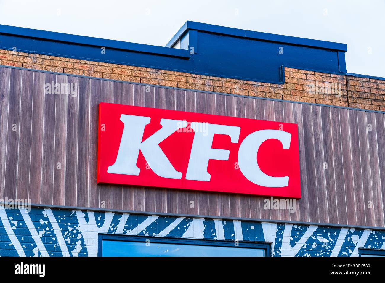 Birmingham, UK – July 4th 2025:  External signage of KFC a fast food chicken restaurant Stock Photo
