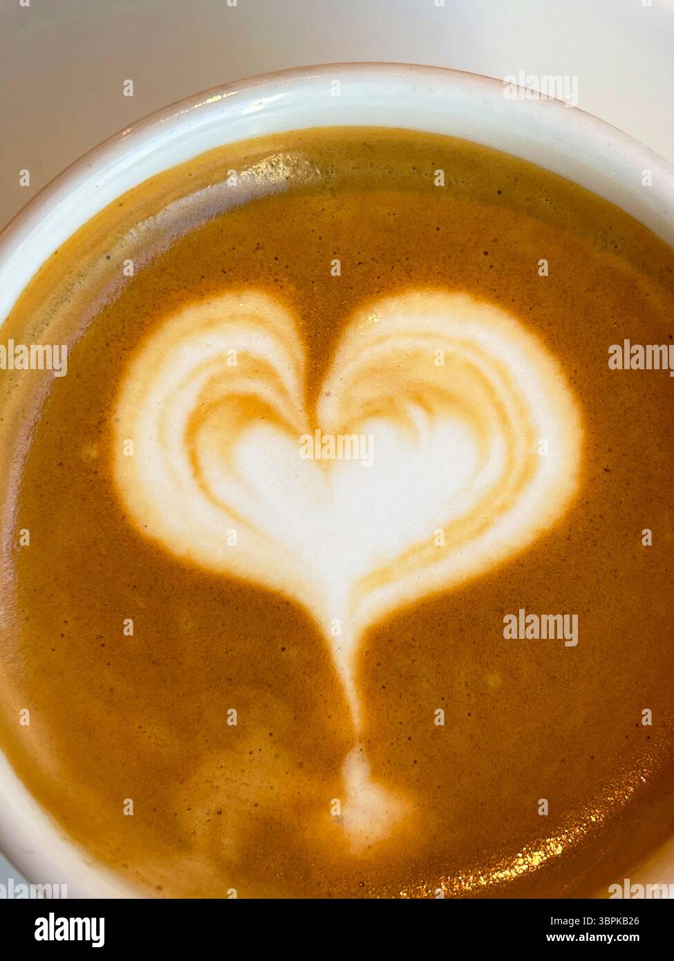 Cup of coffee with heart. Close view. - Smartphone Captured Stock Image