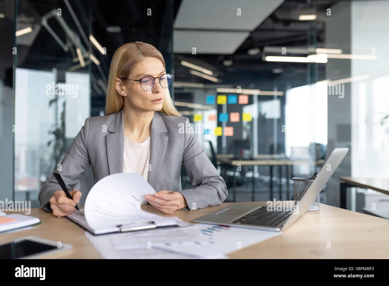 Woman accountant works documents hi-res stock photography and images ...