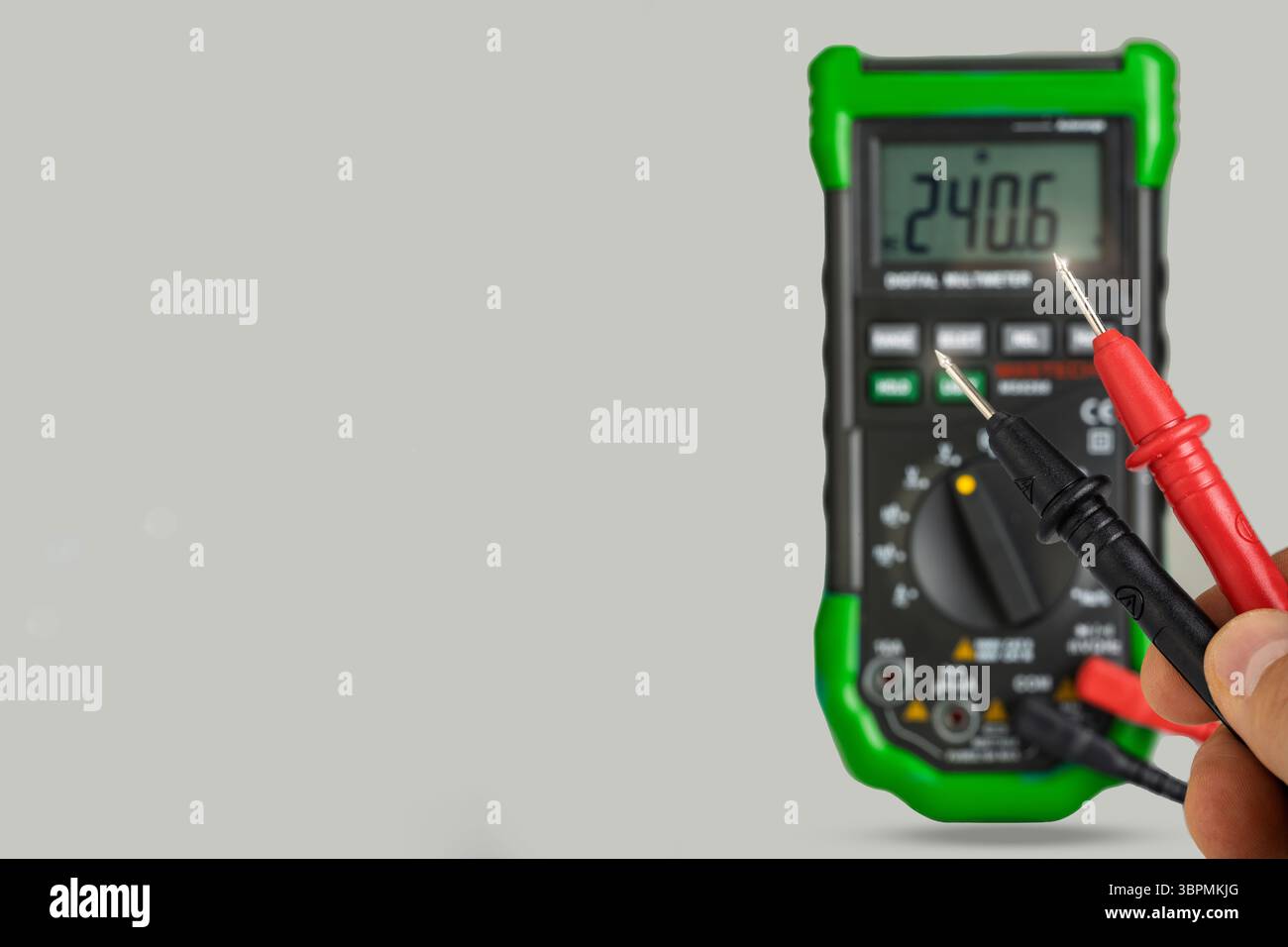 Digital Multimeter with Red and Black Probes Stock Photo