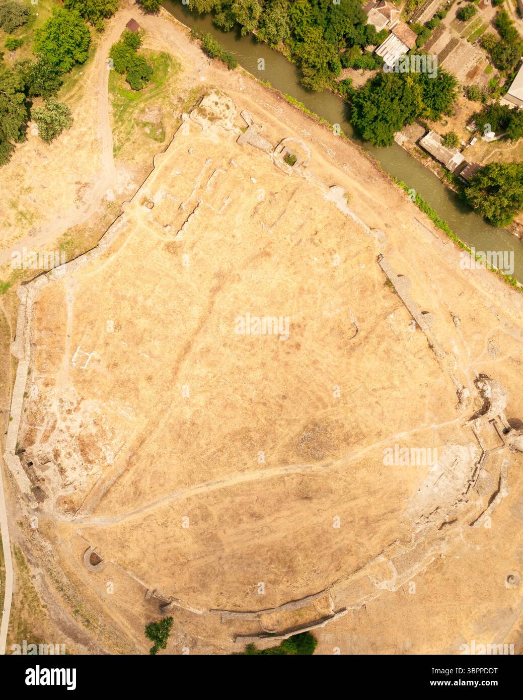 Aerial top down view of ancient Rustavi Fortress ruins near lake ...
