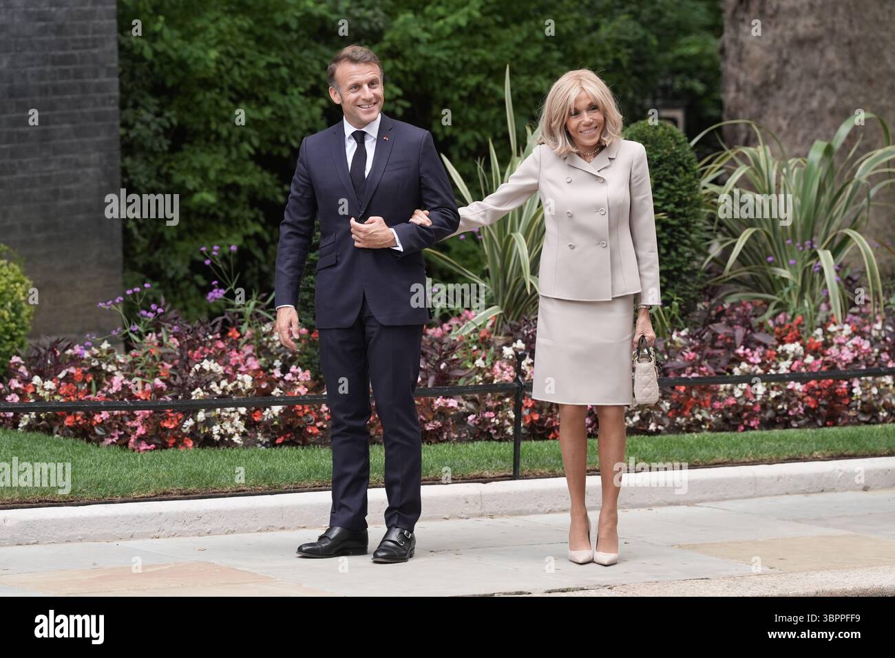 President of France Emmanuel Macron and his wife Brigitte Macron arrive in Downing Street, London, on day two of their state visit to the UK. Picture date: Wednesday July 9, 2025. Stock Photo
