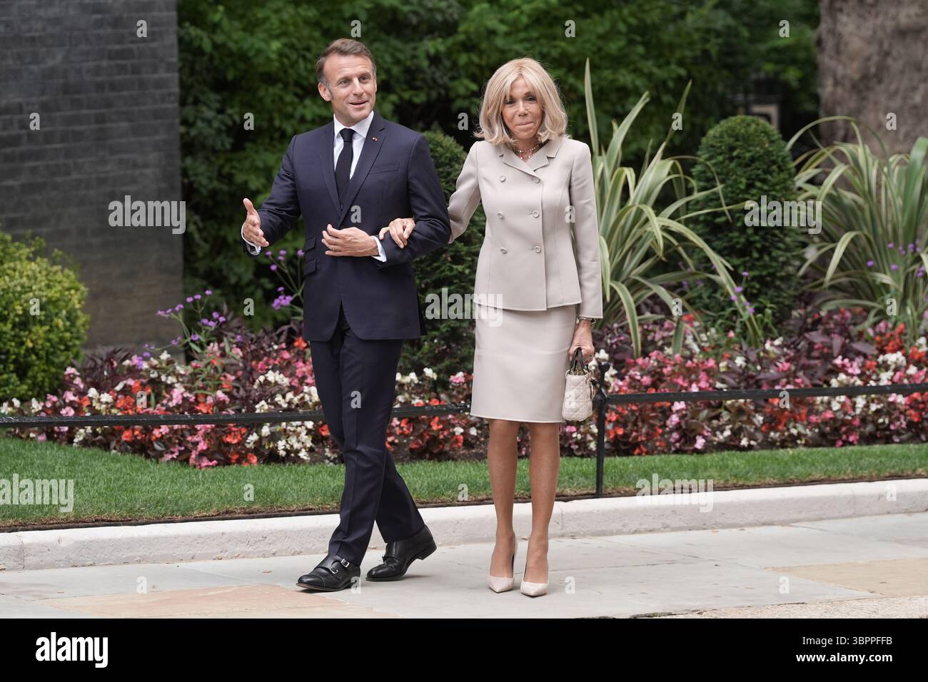 President of France Emmanuel Macron and his wife Brigitte Macron arrive in Downing Street, London, on day two of their state visit to the UK. Picture date: Wednesday July 9, 2025. Stock Photo