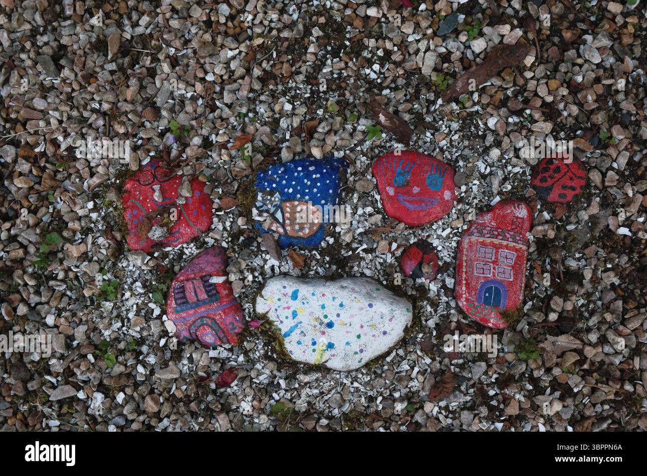 Funky, fun painted pebbles Stock Photo