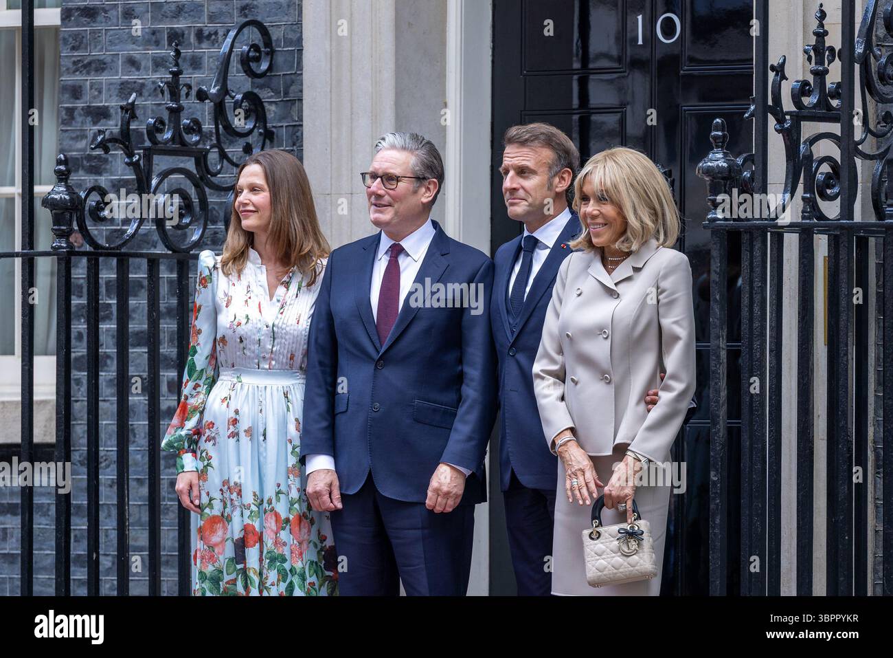 London, UK. 9 July 2025. French President Emmanuel Macron and First Lady Brigitte Macron are welcomed to 10 Downing Street by UK Prime Minister Sir Keir Starmer and his wife Victoria Starmer. The meeting comes during President Macron’s State Visit to the United Kingdom, aimed at strengthening diplomatic and bilateral ties between the two nations. Credit: Abdullah Bailey/Alamy Live News Stock Photo