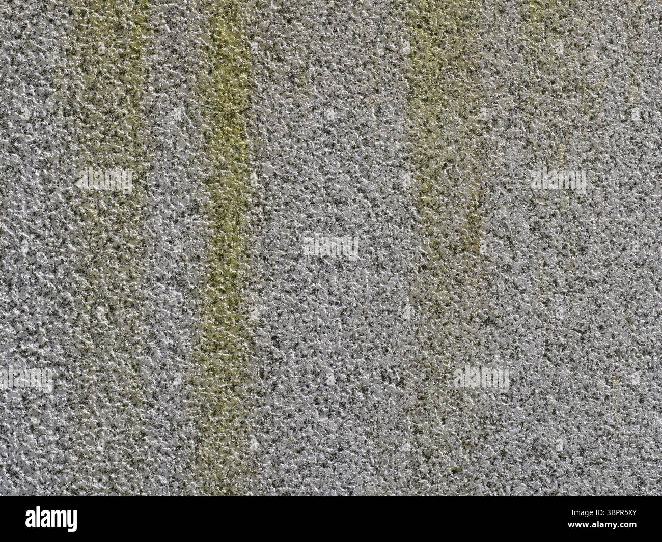 White granite wall as solid support in park design. Full frame, clear texture. Ideal for design projects. Copyspace. Stock Photo