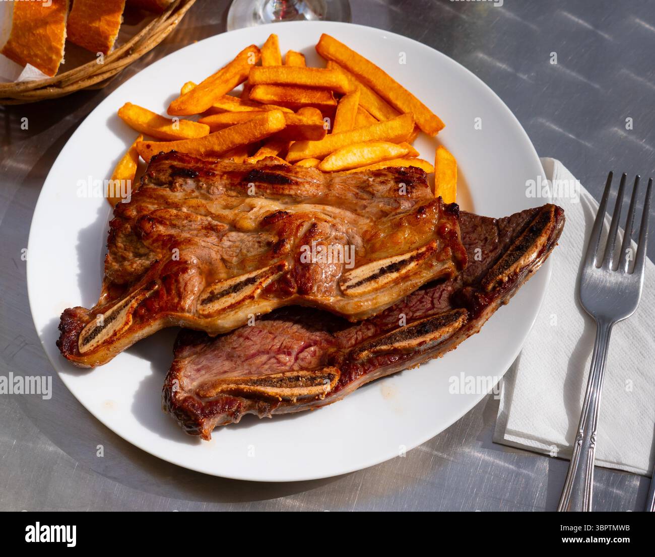 Short Rib Crispy Grilled beef short ribs with crispy fried potatoes Stock Photo - Alamy