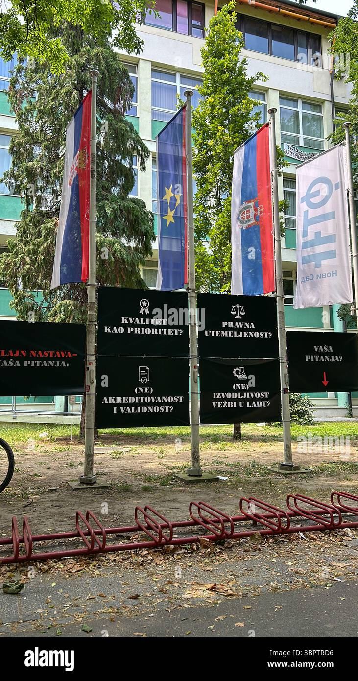 Novi Sad, Serbia – June 17, 2025: Student banners at the Faculty of Technical Sciences highlighting concerns about quality, accreditation, and lab acc - Smartphone Captured Stock Image