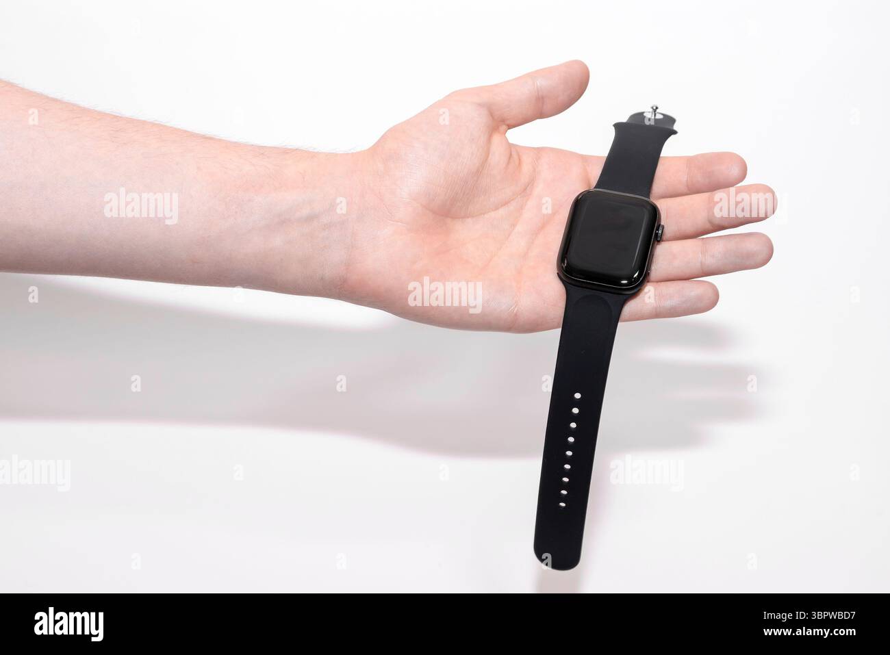Black smart watch on the wrist of a human hand. Human hand with smart ...