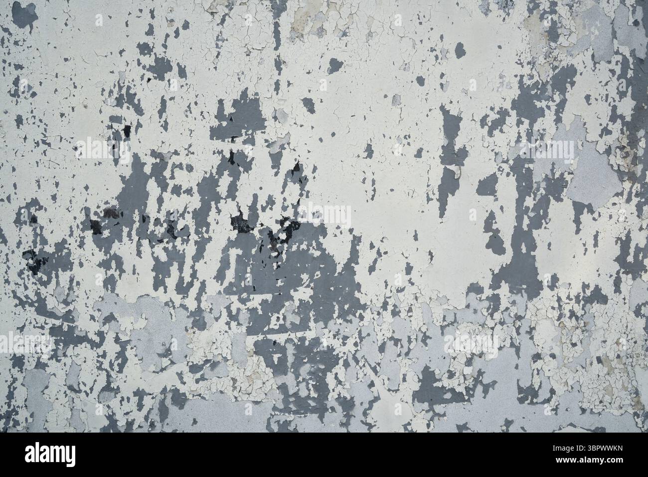 Peeled multiple layers of white, grey and black paint texture Stock Photo