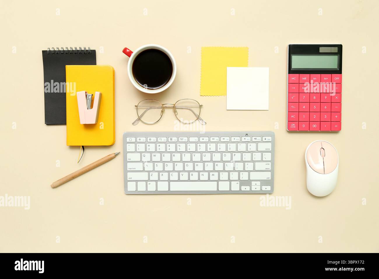 Composition with keyboard, coffee, calculator and notepad on beige background Stock Photo