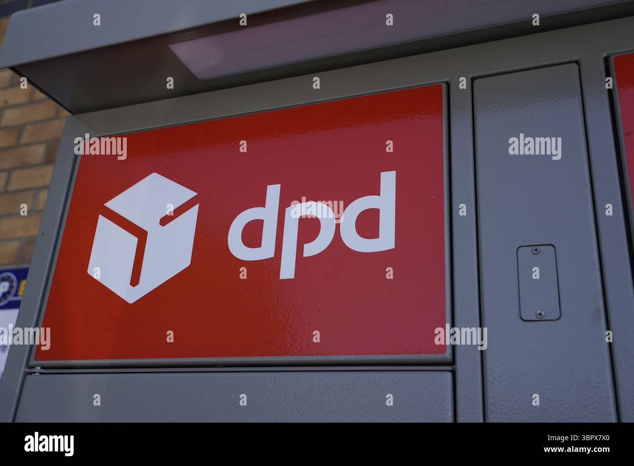 DPD parcel collection and drop off point Corporate logo signs in ...