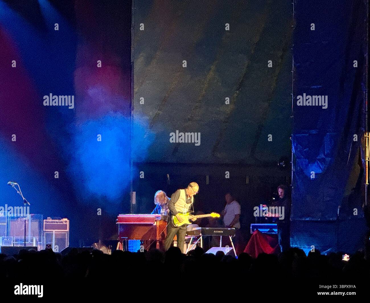 Blues guitarist Joe Bonamassa playing a Fender Stratocaster in concert performing Rory Gallagher songs in Cork for the 30th anniversary of his death - Smartphone Captured Stock Image
