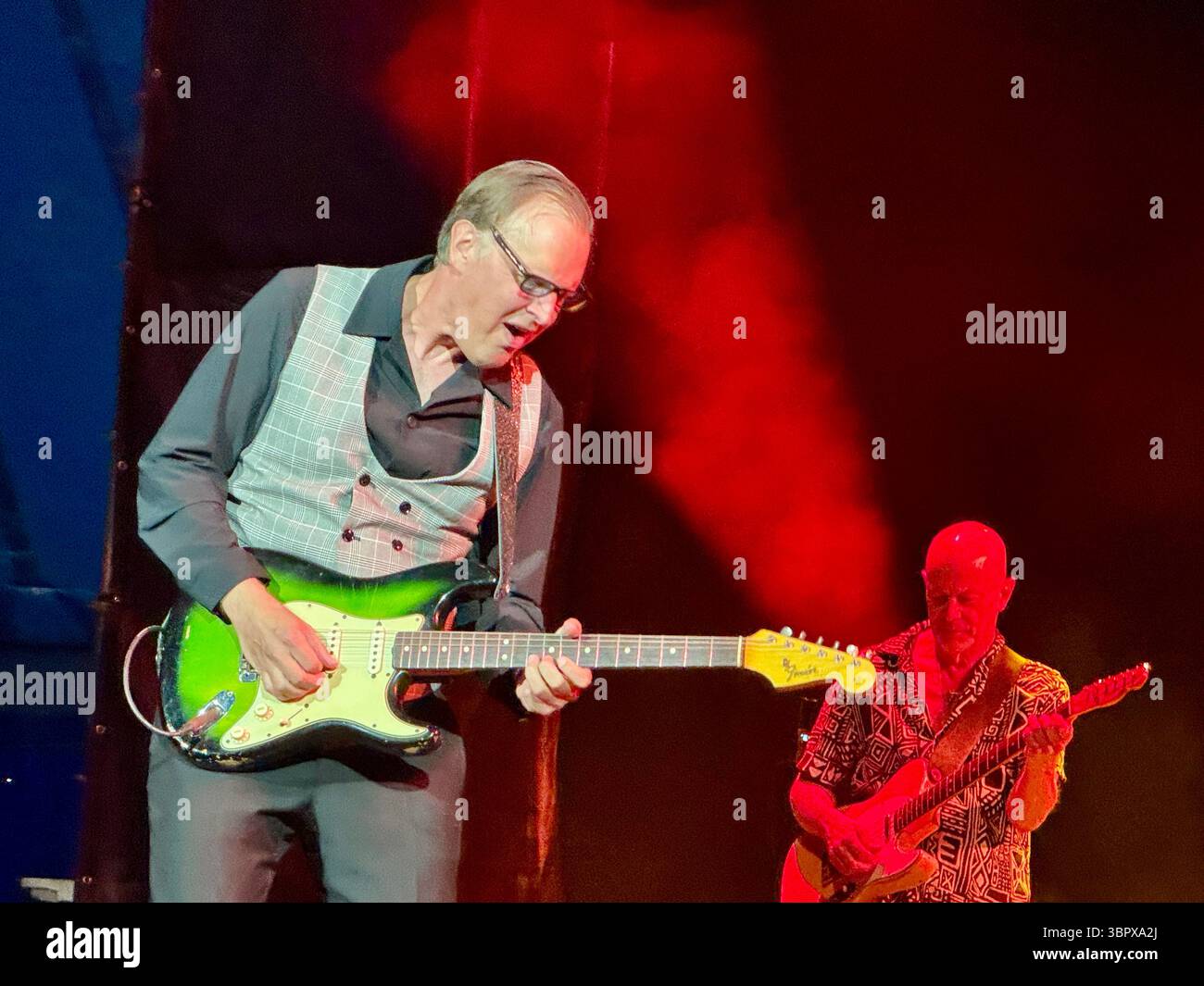 Blues guitarist Joe Bonamassa playing a Fender Stratocaster in concert performing Rory Gallagher songs in Cork for the 30th anniversary of his death - Smartphone Captured Stock Image