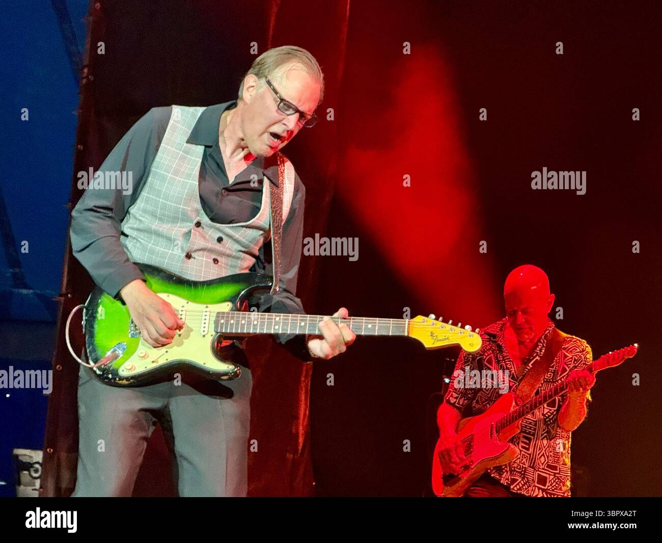 Blues guitarist Joe Bonamassa playing a Fender Stratocaster in concert performing Rory Gallagher songs in Cork for the 30th anniversary of his death - Smartphone Captured Stock Image