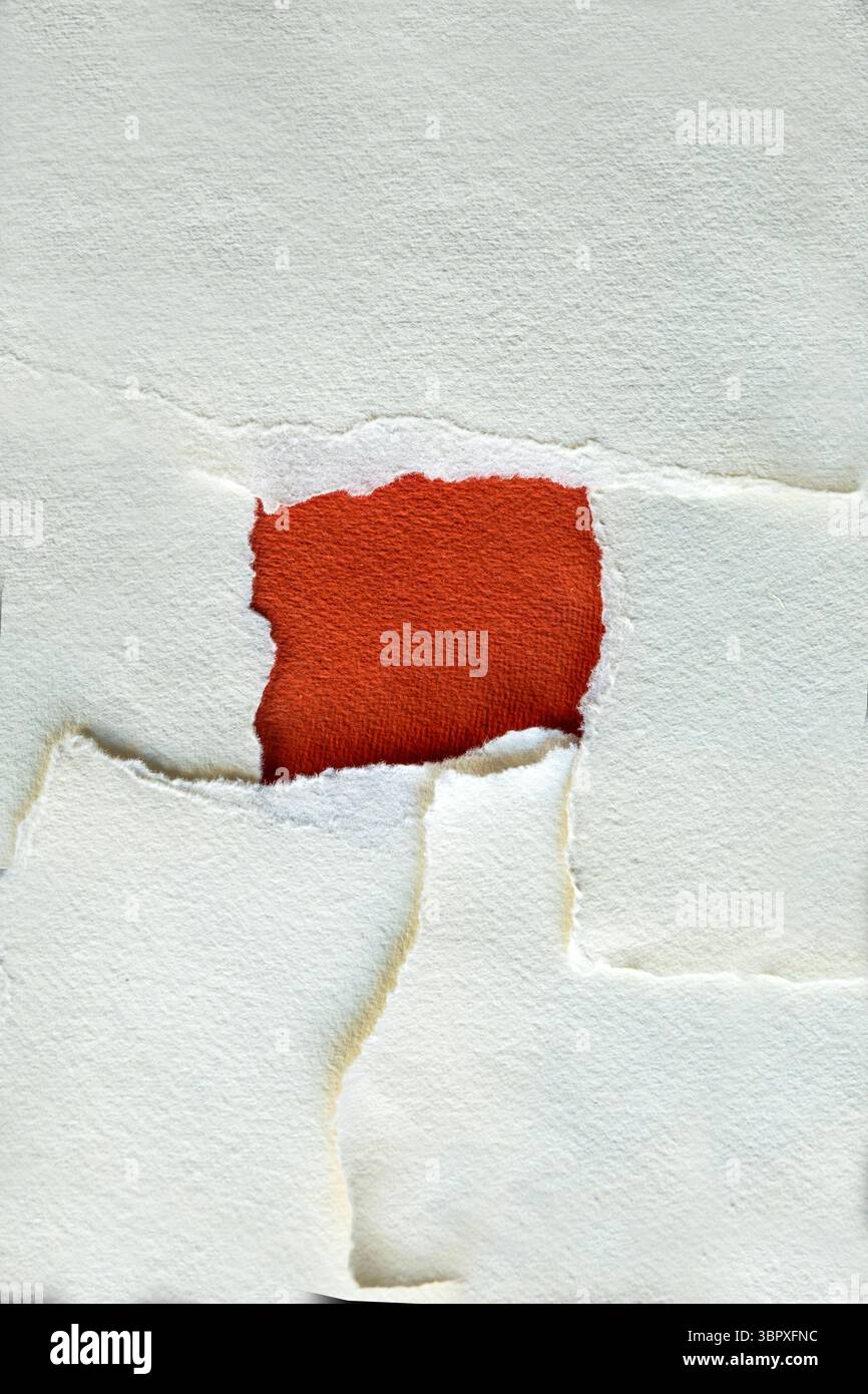 Torn tectured red and white paper background with copy space Stock Photo
