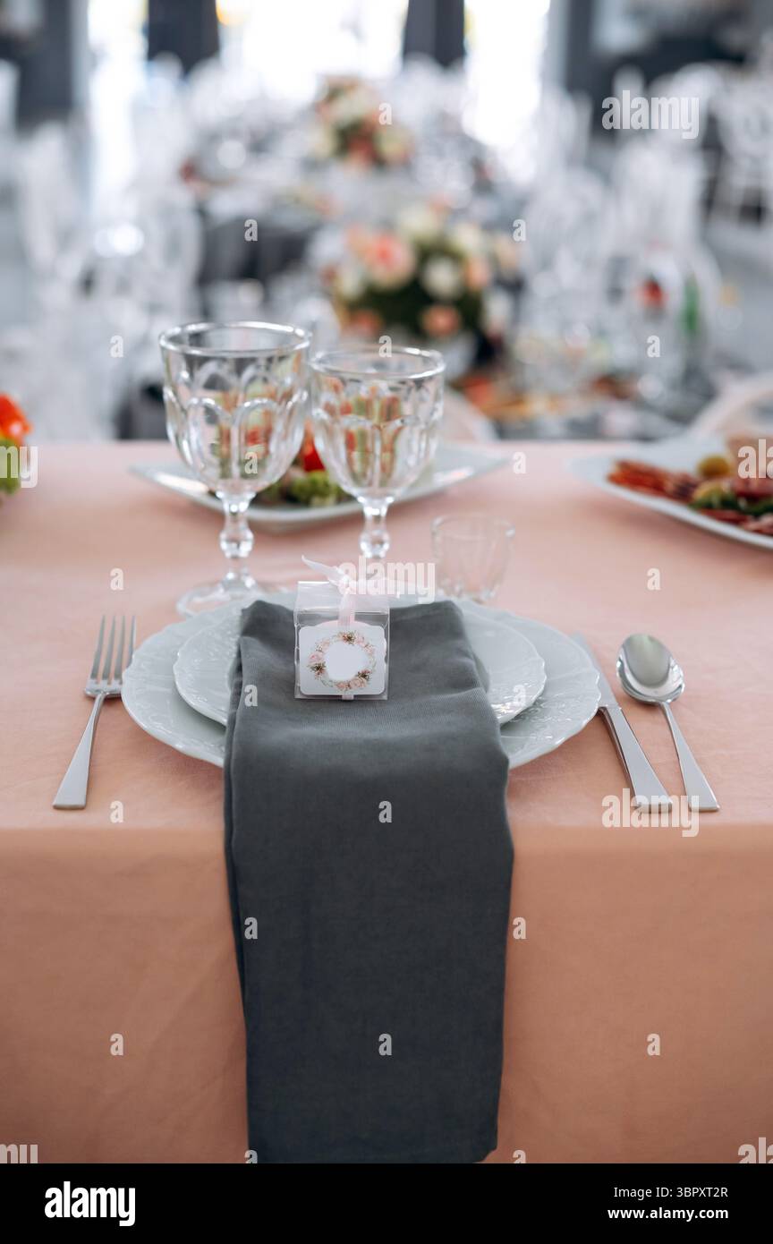 Table set for wedding celebration or another catered event dinner. Selective focus Stock Photo