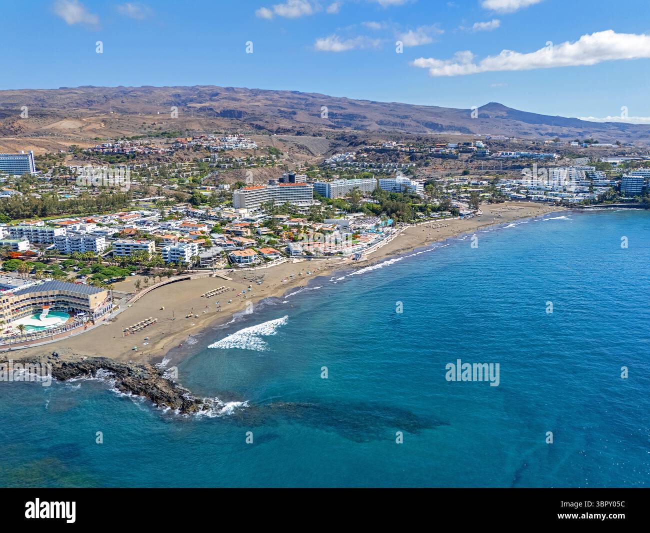 Gran Canaria, Canary Islands, Spain. 8th July 2025. Aerial image of Playa Del Ingles and Playa De San Augustin coastline at Maspalomas. Stock Photo