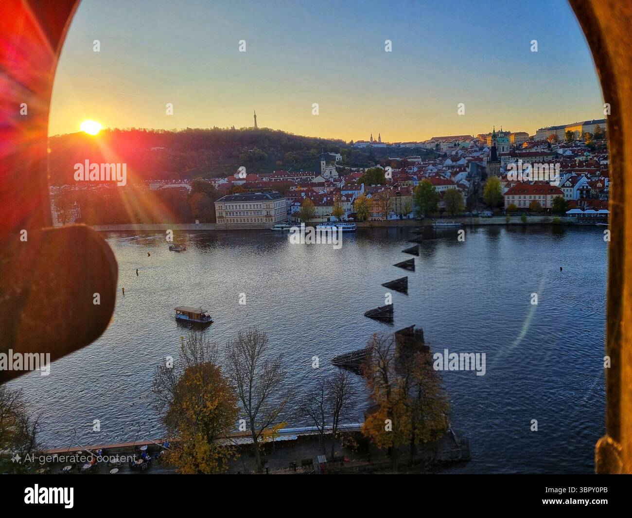 A personal point of view shot capturing the sun setting over the Vltava River and the beautiful historic cityscape of Prague from a high viewpoint. - Smartphone Captured Stock Image